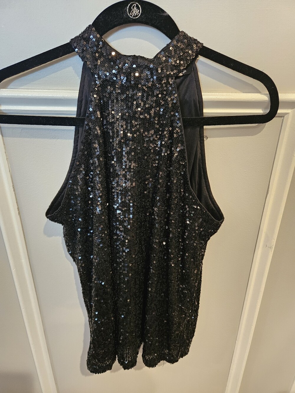 Black sequined halter top by Cable and Gauge Size small.